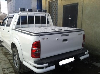 Алюминиевая крышка кузова (Трансформер) для Toyota Hilux - ОбвесКарРу VIN: HILUX11niis. 