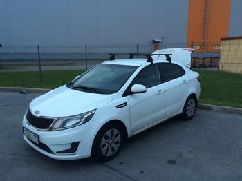 Багажник LUX на прямоугольных дугах для Kia Rio - ОбвесКарРу VIN: 690014-КА LUX RioSd11-691. 
