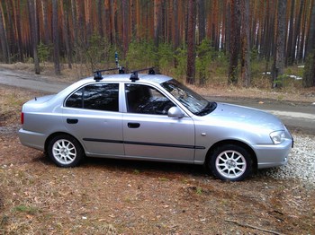 Багажник LUX на прямоугольных дугах для Hyundai Accent - ОбвесКарРу VIN: 690014-КА LUX Accent06-69. 
