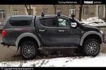 Багажник Thule на аэродинамических дугах для Mitsubishi L200