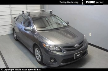 Багажник Thule на аэродинамических дугах для Toyota Corolla - ОбвесКарРу VIN: 961-754-1446. 