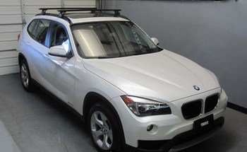 Багажник Thule на аэродинамических дугах для BMW X1 - ОбвесКарРу VIN: 961200-753-4013. 