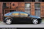 Багажник Thule на аэродинамических дугах для Ford Focus