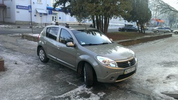 Багажник Thule на аэродинамических дугах для Renault Sandero - ОбвесКарРу VIN: 969-754-1378. 