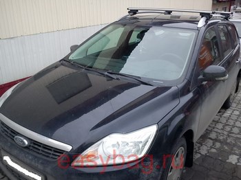 Багажник Thule на аэродинамических дугах для Ford Focus - ОбвесКарРу VIN: 961-757. 