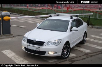 Багажник Thule на аэродинамических дугах для Skoda Octavia - ОбвесКарРу VIN: 969-754-1594. 
