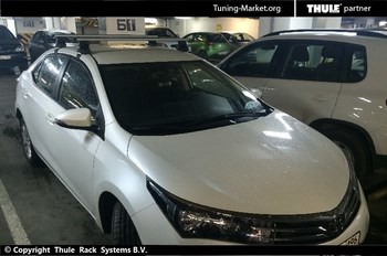 Багажник Thule на аэродинамических дугах для Toyota Corolla - ОбвесКарРу VIN: 961-754-1746. 