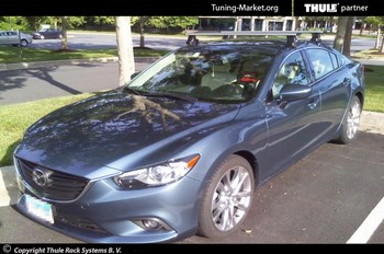 Багажник Thule на аэродинамических дугах для Mazda 3 - ОбвесКарРу VIN: 962-754-1742. 
