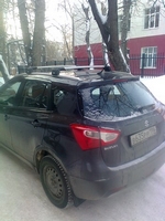 Багажник Thule на интегрированных дугах для Suzuki SX4