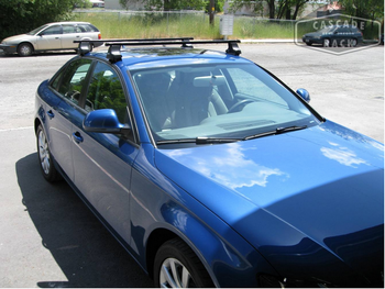 Багажник Thule на стальных дугах для Audi A4 - ОбвесКарРу VIN: 769-754-1462. 