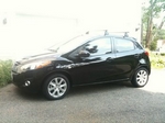 Багажник Thule на стальных дугах для Mazda 2