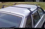 Багажник Thule SquareBar на стальных дугах для Lada 2114