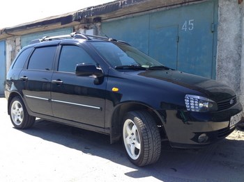 Багажник Thule WingBar Edge на интегрированных дугах для Lada Kalina 1117 - ОбвесКарРу VIN: 9581. 
