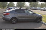 Багажник Thule WingBar на аэродинамических дугах для Kia Rio