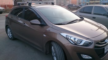 Багажник Thule WingBar на аэродинамических дугах для Hyundai i30 - ОбвесКарРу VIN: 961-753-3119. 