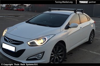 Багажник Thule WingBar на аэродинамических дугах для Hyundai i40 - ОбвесКарРу VIN: 962-754-1694. 