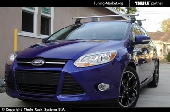 Багажник Thule WingBar на аэродинамических дугах для Ford Focus - ОбвесКарРу VIN: 969-754-1634. 