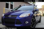 Багажник Thule WingBar на аэродинамических дугах для Ford Focus