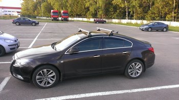 Багажник Thule WingBar на аэродинамических дугах для Opel Insignia - ОбвесКарРу VIN: 962-754-1513. 