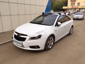 Багажник Thule WingBar на аэродинамических дугах для Chevrolet Cruze - ОбвесКарРу VIN: 969-754-1569. 