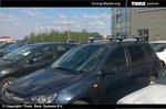 Багажник Thule WingBar на аэродинамических дугах для Lada Kalina 1117