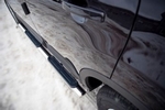 Пороги труба D75хD42 овал с накладками RUSSTAL для Nissan Qashqai