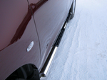 Пороги труба D75хD42 овал с накладками RUSSTAL для Toyota RAV4