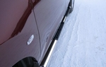 Пороги труба D75x42 овал с накладками RUSSTAL для Nissan Murano
