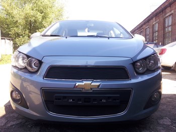 Защитная сетка радиатора ProtectGrille нижняя для Chevrolet Aveo (2012-н.в. Черная) - ОбвесКарРу VIN: CHAV.bot.black. 