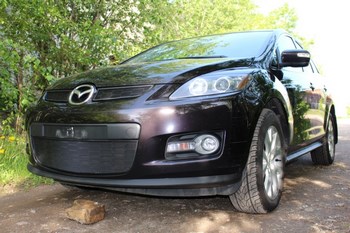 Защитная сетка радиатора ProtectGrille Premium верхняя для Mazda CX7 (2006-2010 Черная) - ОбвесКарРу VIN: MAZCX7.06.top.black. 