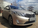 Защитная сетка радиатора ProtectGrille верхняя для KIA RIO (2011-2015 Черная)